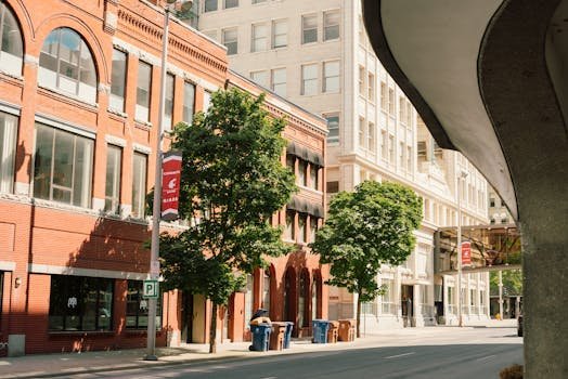 A vibrant street in downtown Spokane, WA showcasing historic architecture.